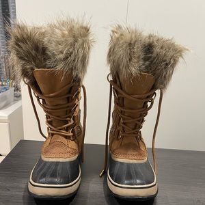 Sorel black and tan snow boots